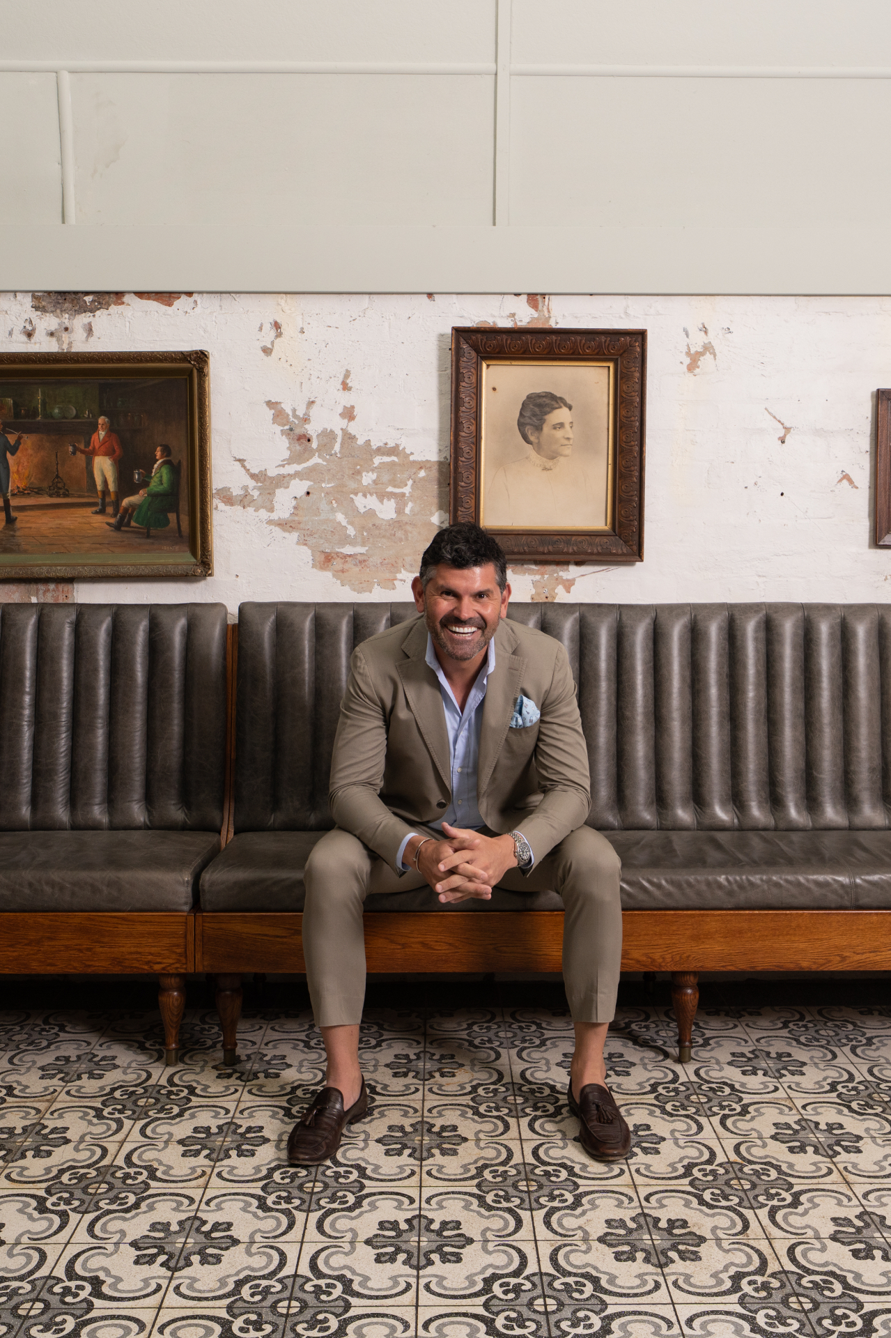 Patrick McKinnon seated in a Brisbane bar